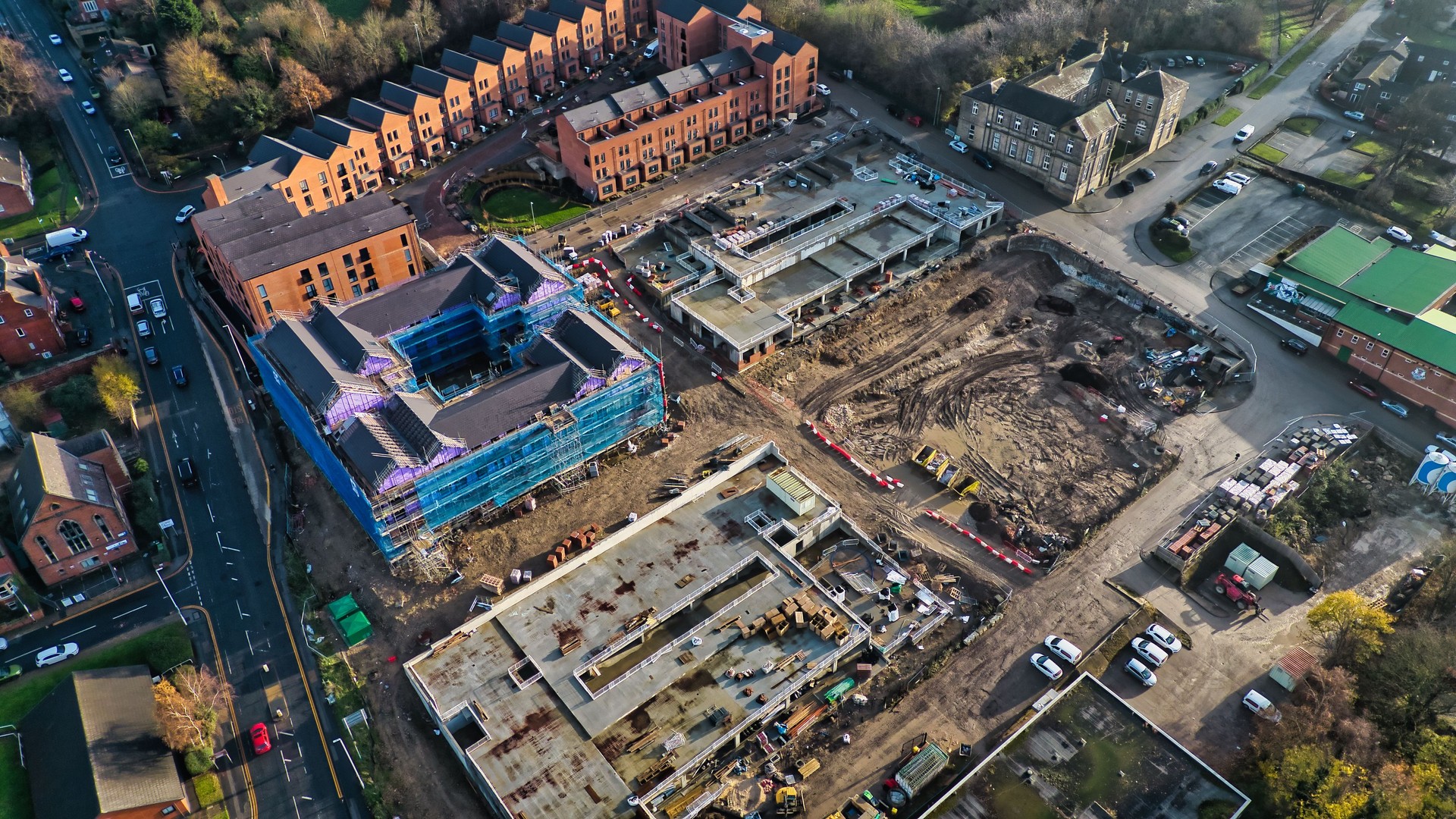Aerial View of Construction Site with Residential and Commercial Buildings Under Development, Leeds